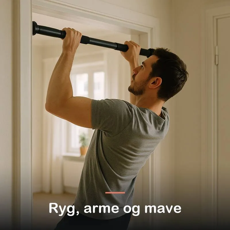 Mand h&aelig;nger i en pull up-stang i en d&oslash;rkarm midt i en optr&aelig;kning