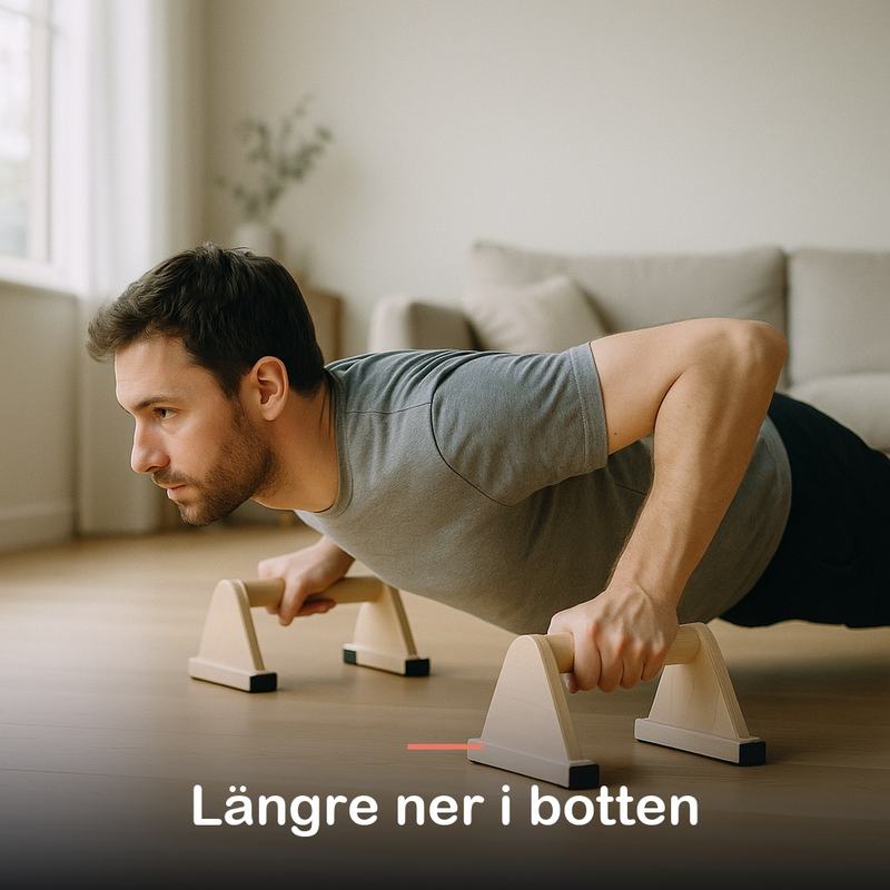 Man i botten av en armhävning med händerna på två trähandtag