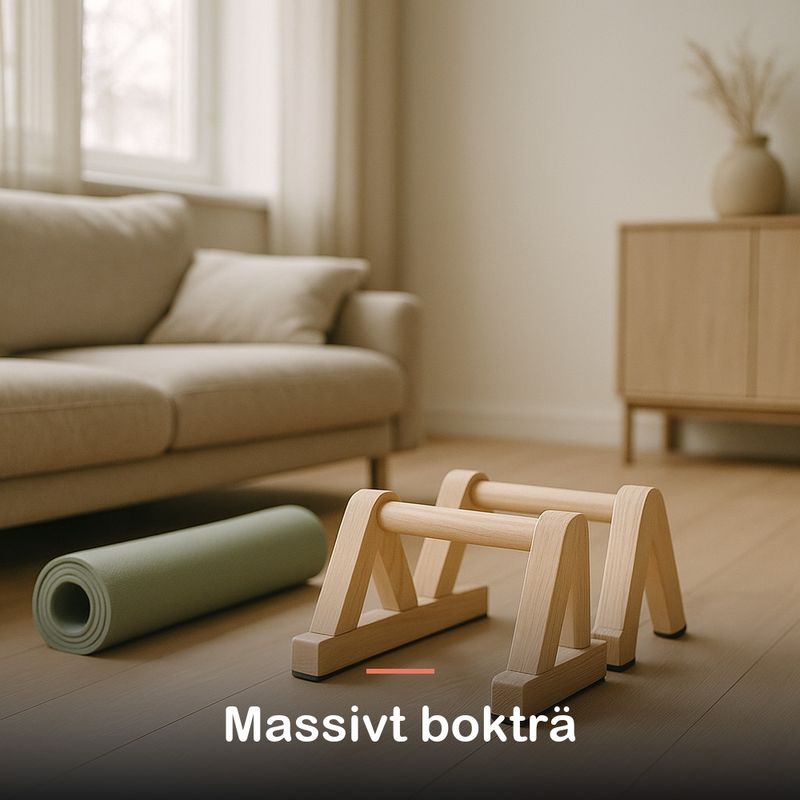 Ett par armhävningshandtag i trä står på golvet bredvid en matta